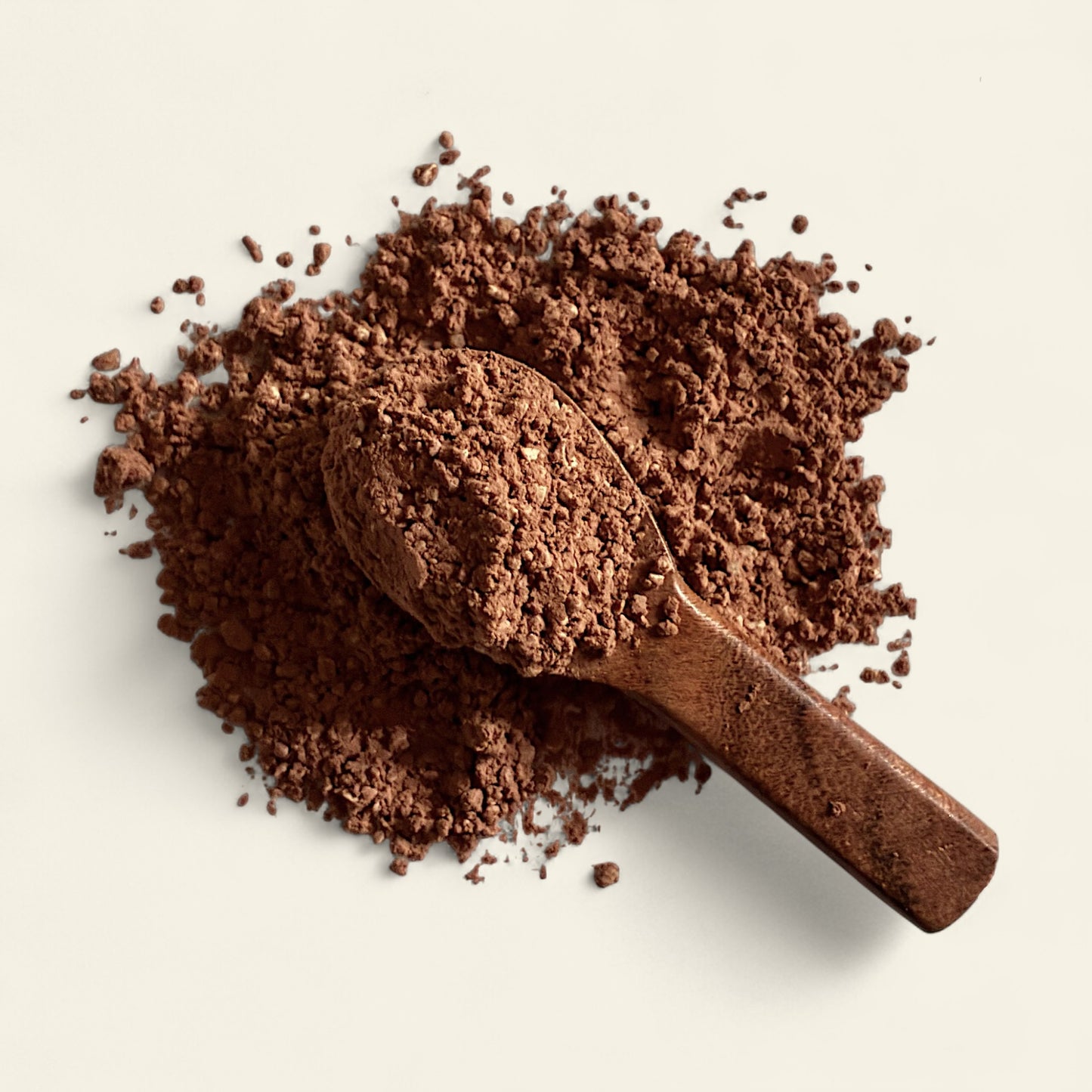 All's Well Teas and Elixirs Morning Boost - A warm, robust coffee alternative crafted to fuel your day with feel-good energy from naturally invigorating botanicals.

Wooden scoop in a pile of cocoa powder on a light background