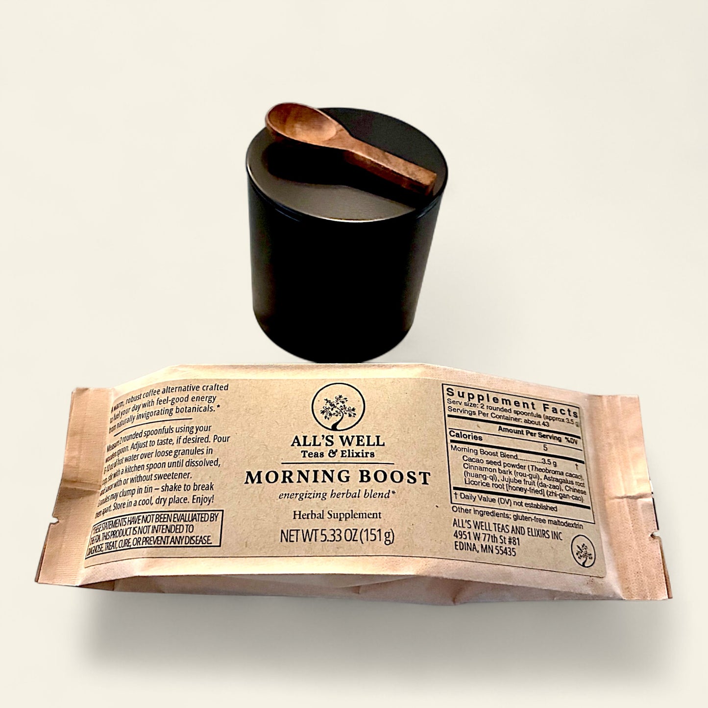 All's Well Teas and Elixirs Morning Boost - A warm, robust coffee alternative crafted to fuel your day with feel-good energy from naturally invigorating botanicals.

Tea herbal supplement package with a black tin and wooden spoon on a light background