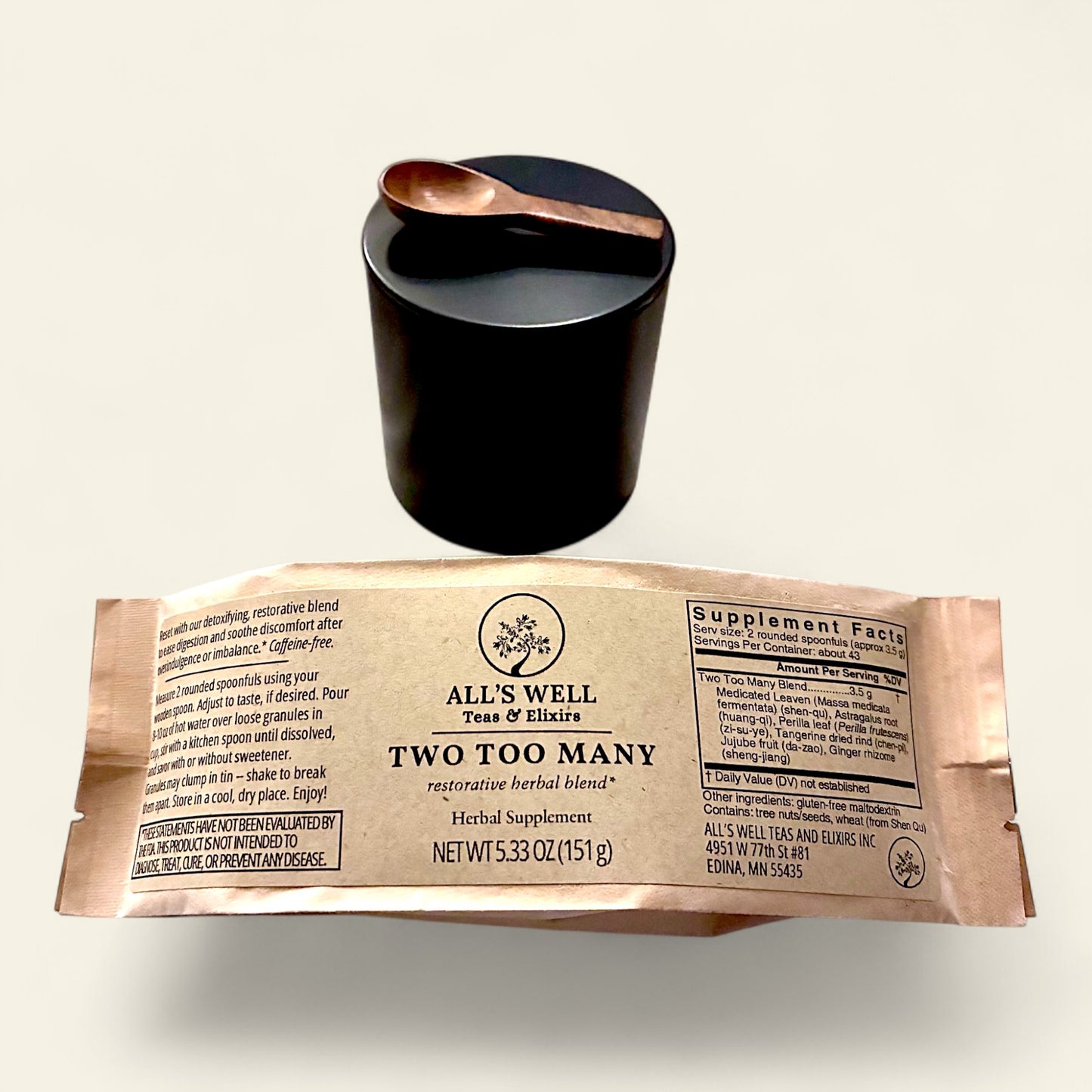 All's Well Teas and Elixirs Two Too Many - Our detoxifying, restorative blend to ease digestion and soothe discomfort after overindulgence or imbalance.

Herbal supplement package with a black tin and wooden spoon on a light beige background