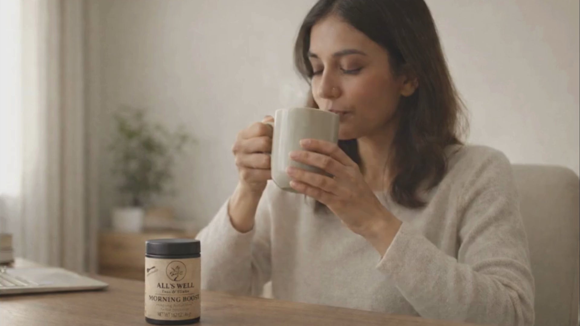Load video: All's Well Teas and Elixirs - A woman drinks a cup of Morning Boost to get ready for her day. 